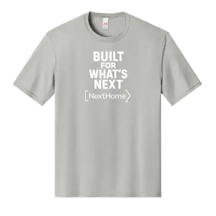 T-shirt featuring the phrase "Built or What's Next" in bold lettering on a plain background.