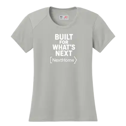 Ladies' performance t-shirt featuring the phrase "Built What's Next?" in a modern design.